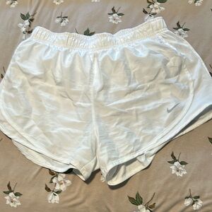 White Nike shorts